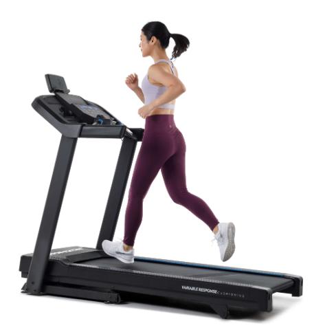 Woman running on the Horizon T101 Treadmill