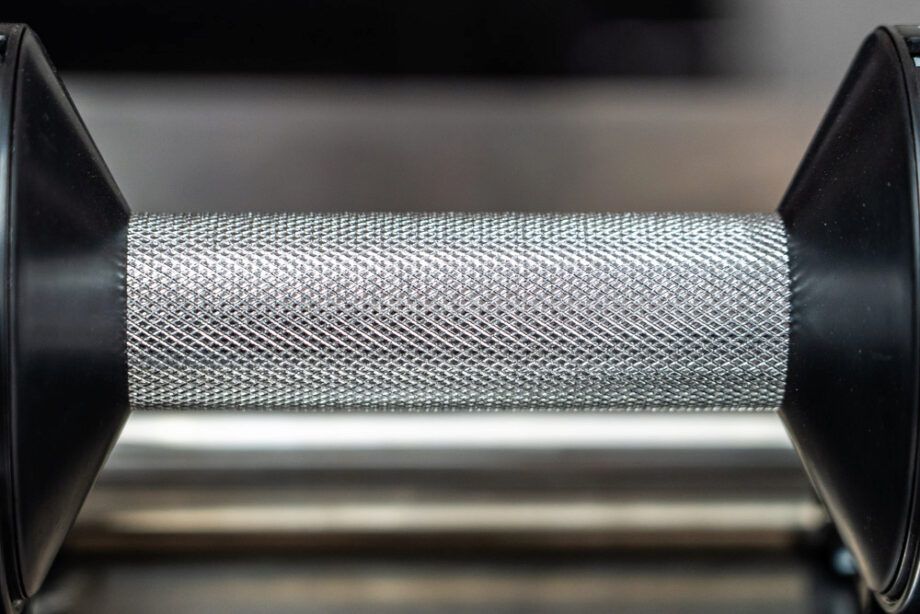 The handle of a Nuobell dumbbell