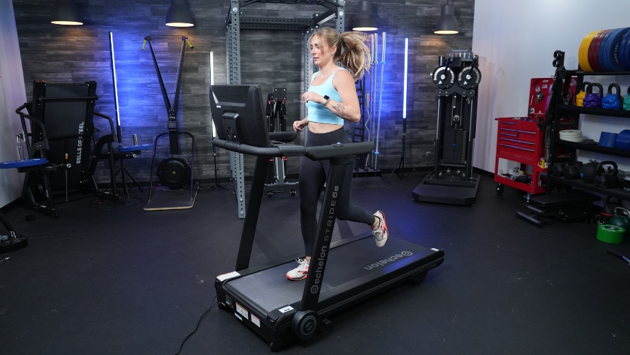 A woman runs on the Echelon Stride 6S.
